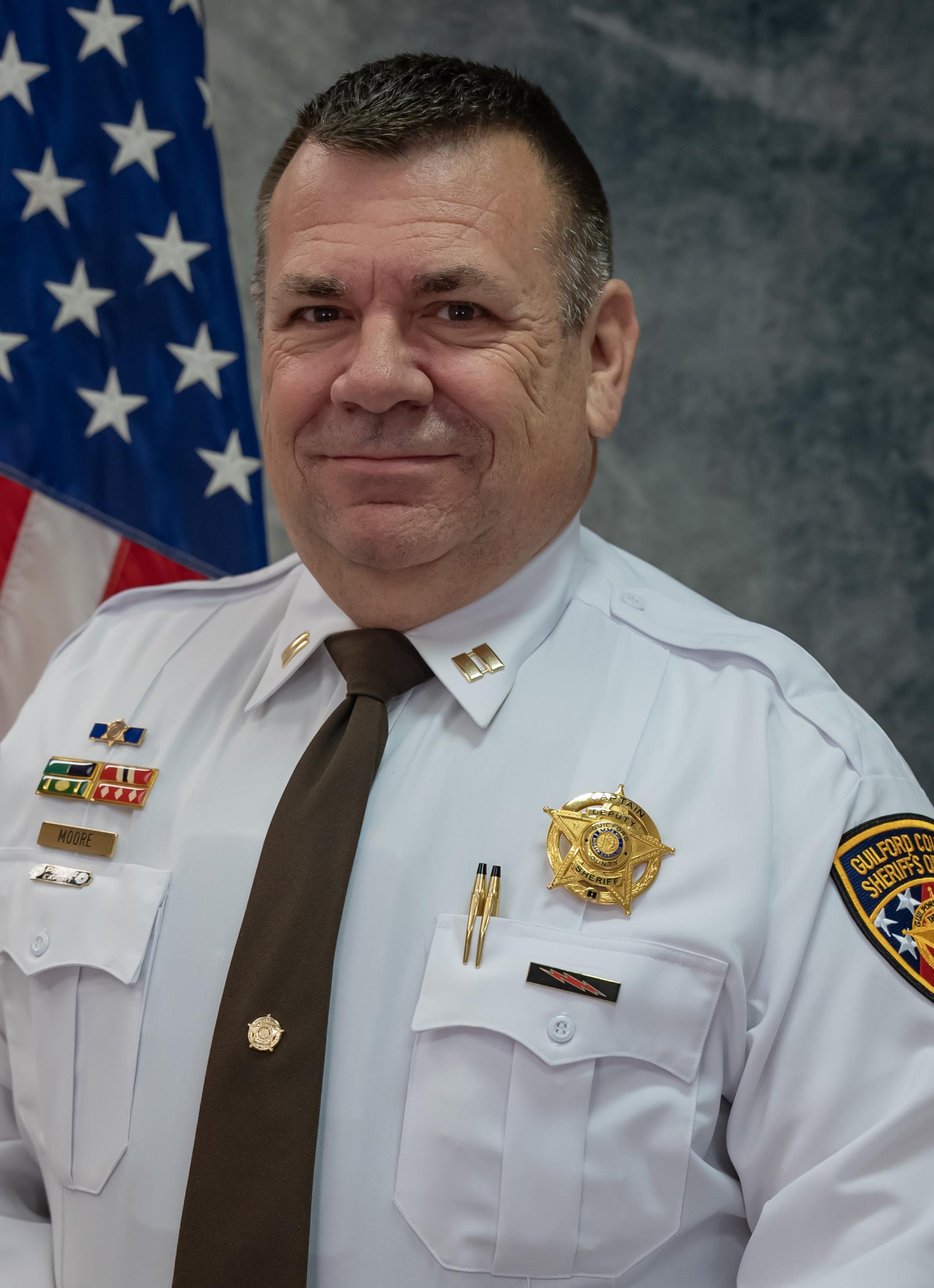 Captain Moore, M