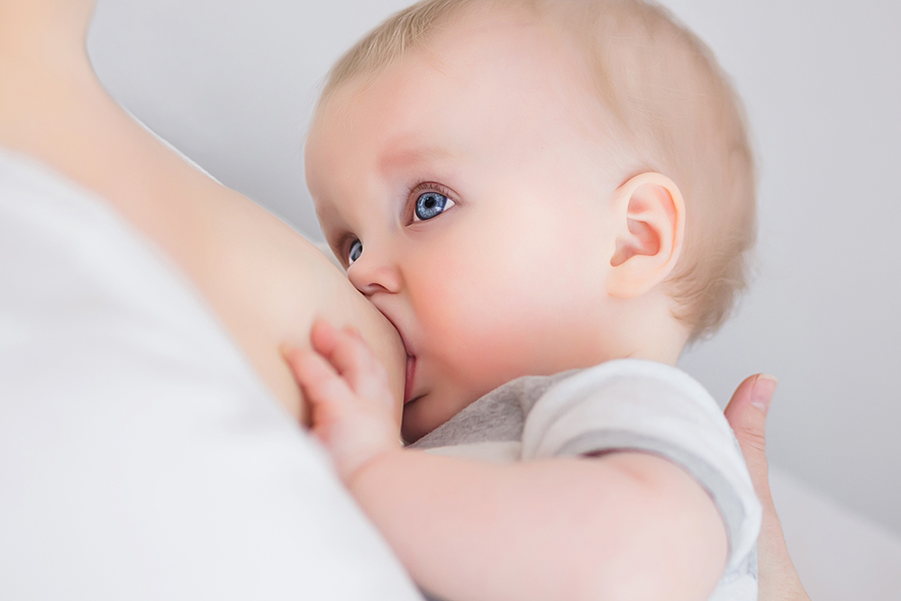 mother breastfeeding baby